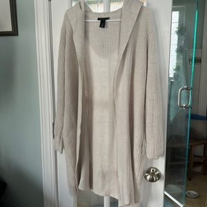 Excellent condition. White House/Black Market Long Cream cardigan with pockets.